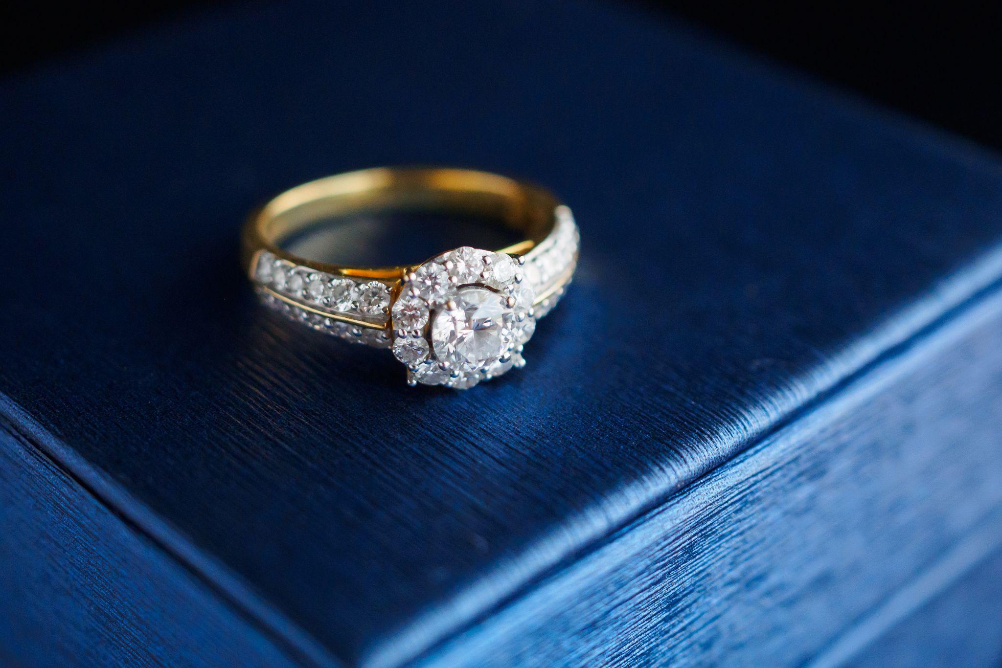 wedding gold diamond ring on jewelry box
