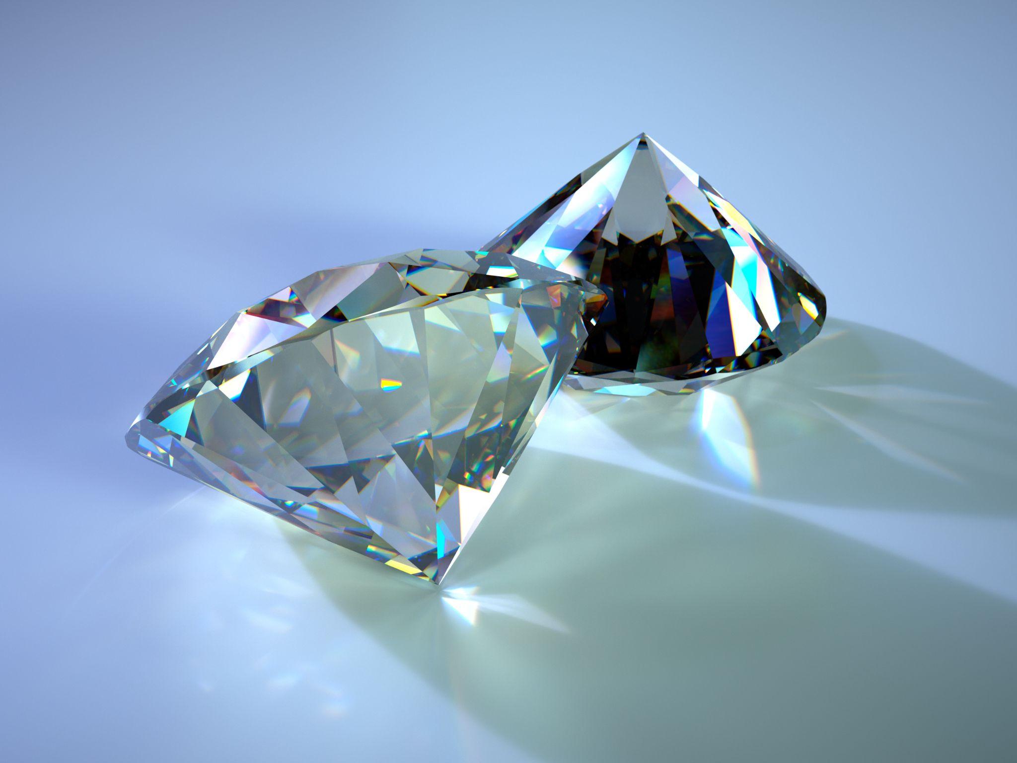Two gems with caustics placed on blue plane