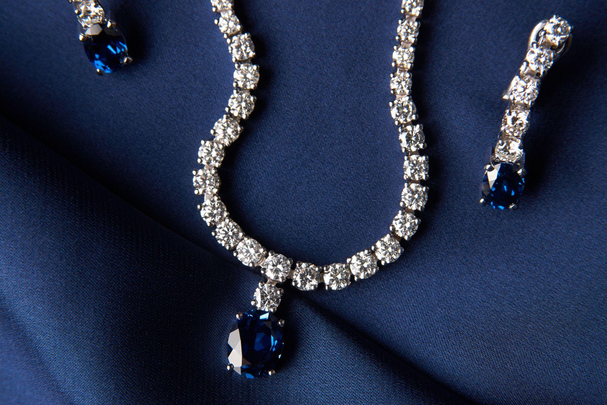 diamond jewelry set on blue silk
